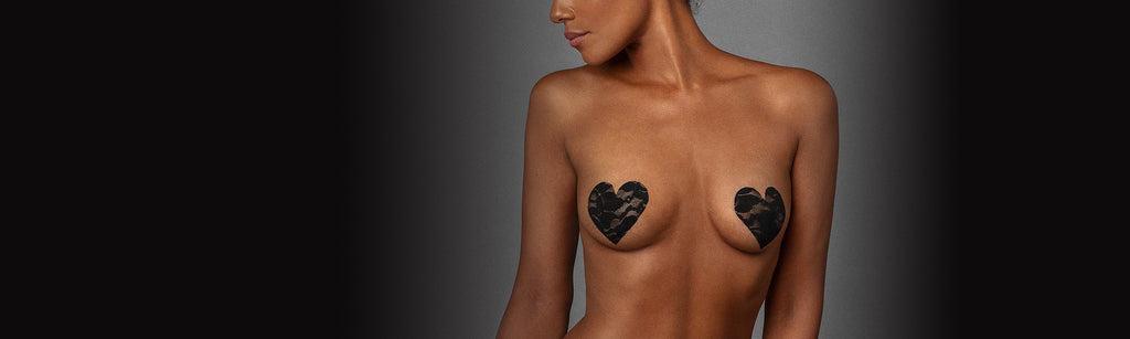 Woman wearing Nippies Bristols Six Heart Shaped Black Lace Nipple Covers