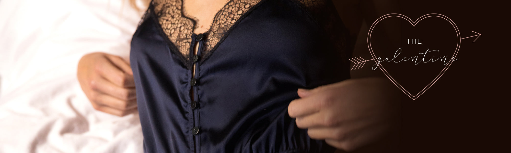 Woman wearing the Kiki de Montparnasse Teddy, a lacy silk black lingerie teddy perfect for any galentine.