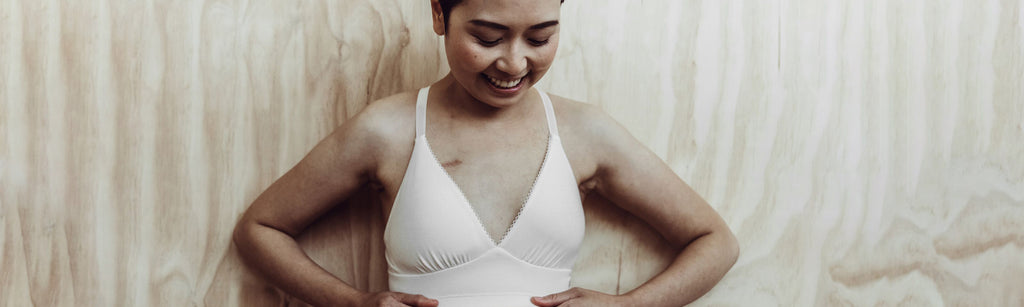 Woman wearing the Mastectomy Make Merry Pocketed Plunge Bra