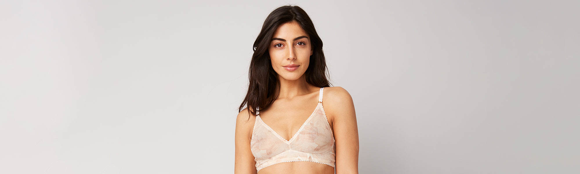 Female model wearing the Stella McCartney Juliet Skipping Contour Plunge Bra