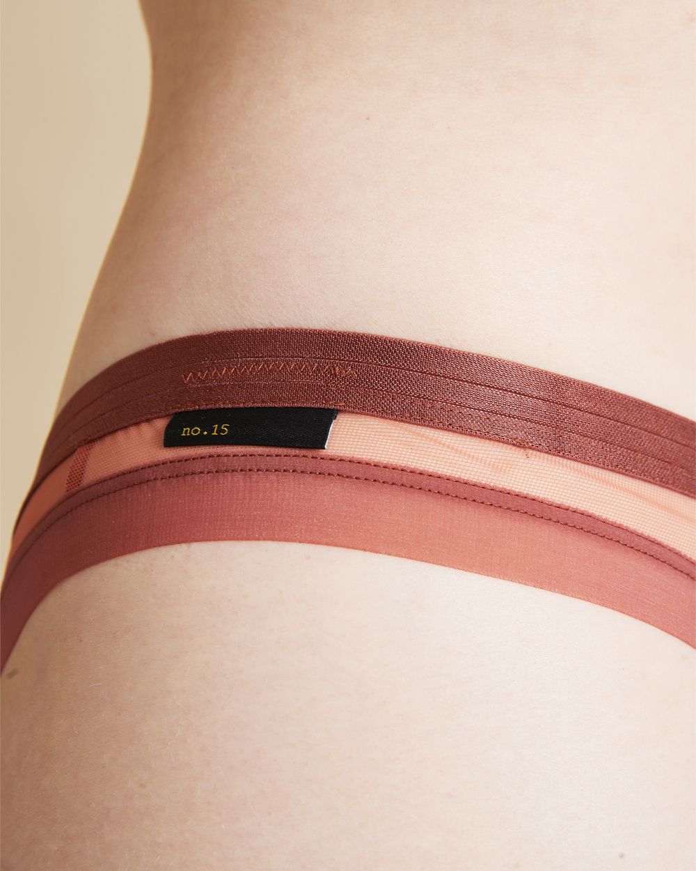 The Underargument For Play Against Performance Be Unexpected Thong in orange