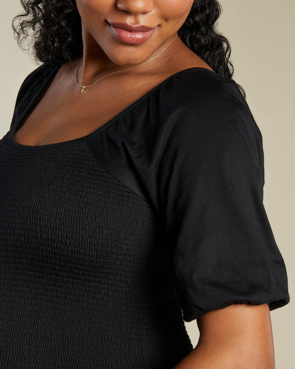 A Pea In the Pod Nest Smocked Midi Dress in black