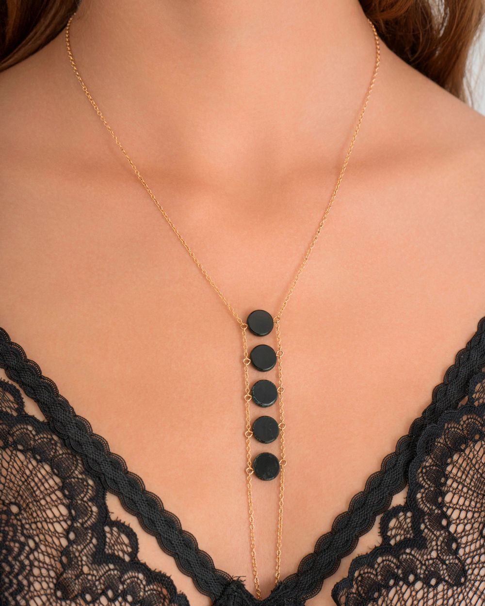 Goldish Black Onyx Ladders Handchain in black