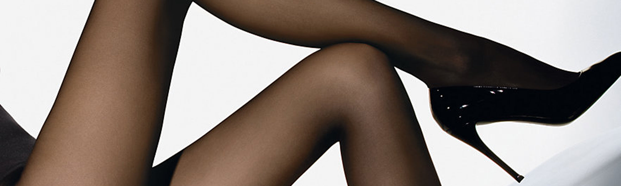 Female model wearing Wolford Individual 10 Sheer Tights