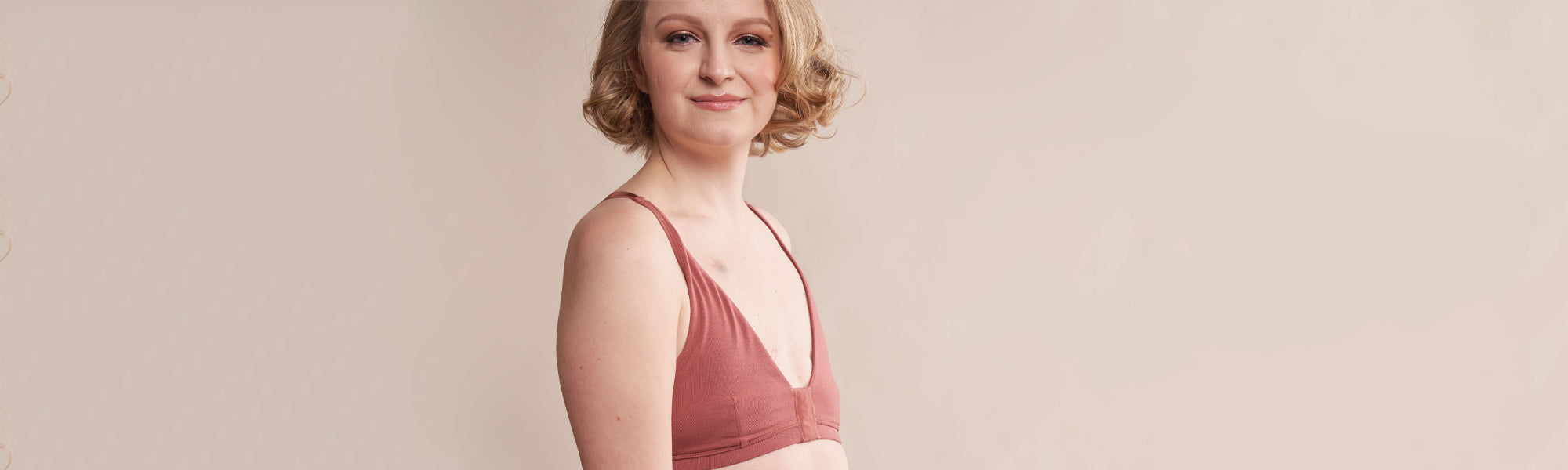 Woman wearing the Mastectomy AnaOno Melissa Pocketed Racerback Bra