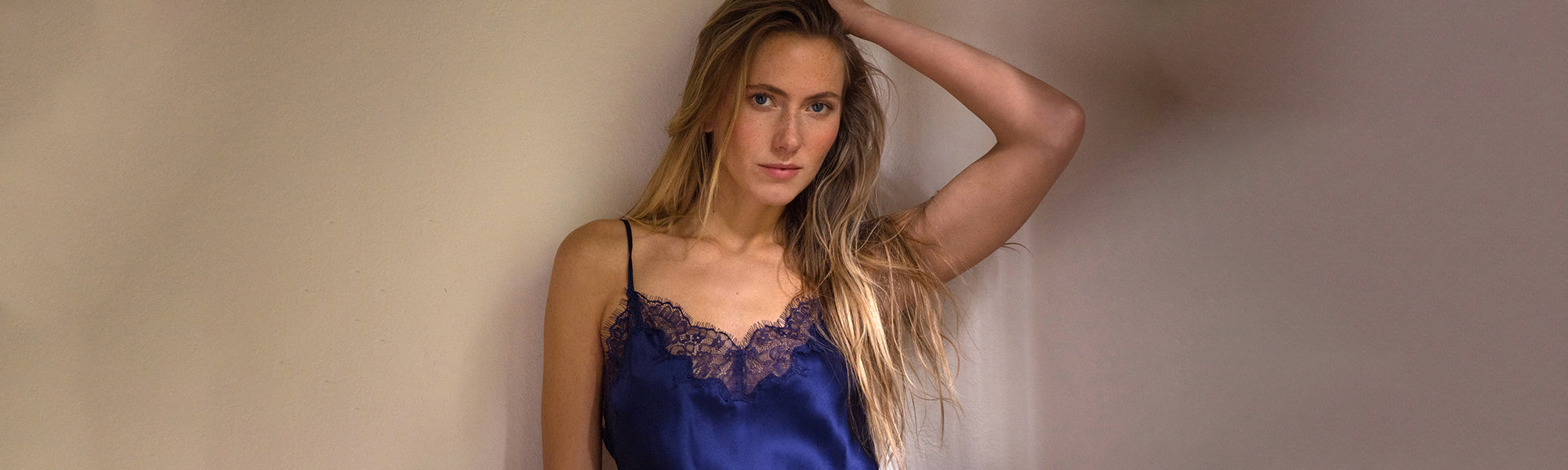 Female model wearing the Journelle Charlotte Camisole