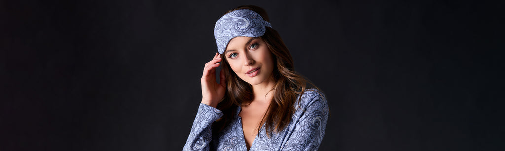 Female model wearing the Hanro Jersey Long Sleeve Print Shirt and Sleep Mask