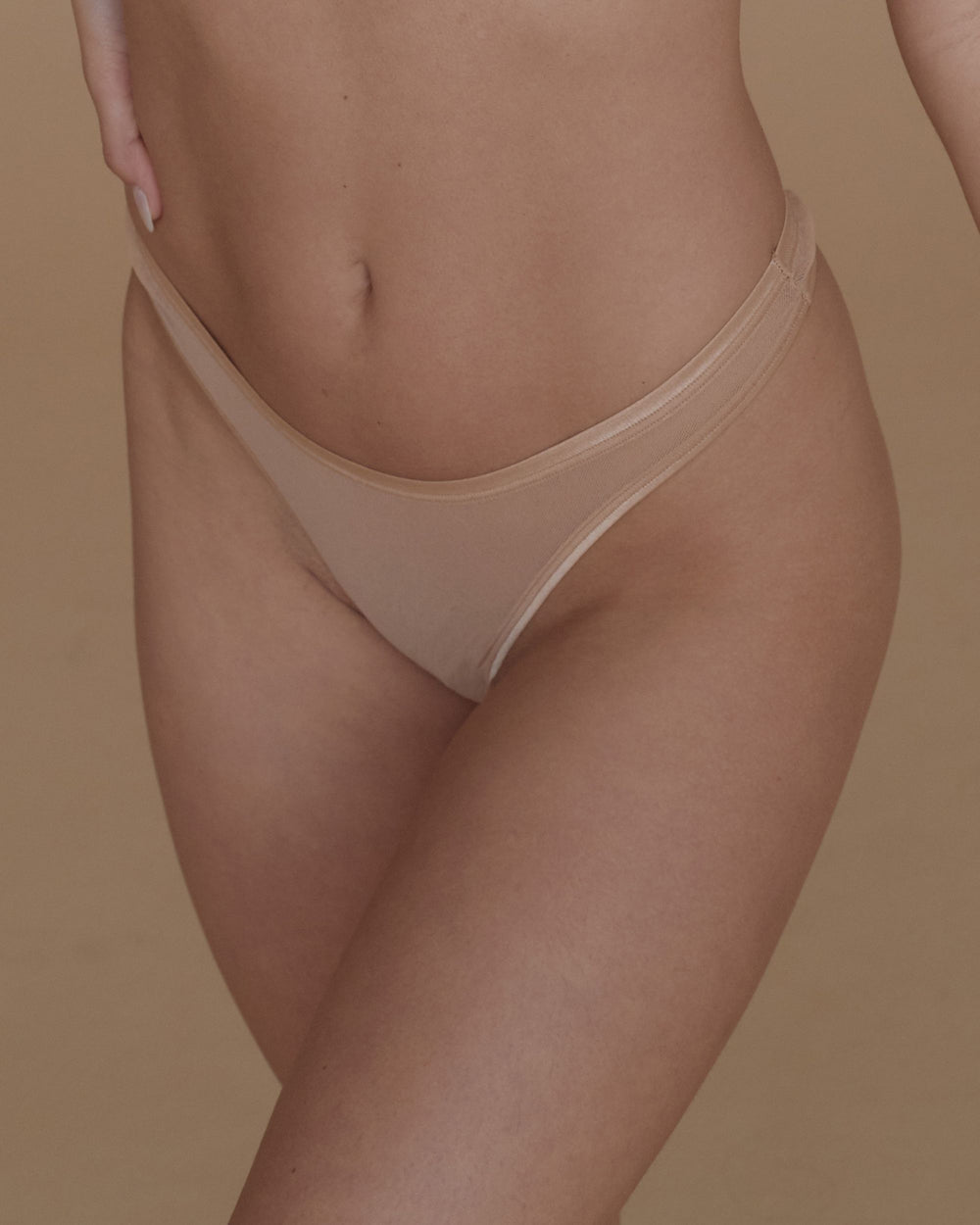 Soire Confidence Classic Thong (Packaged) in beige - front view | Cosabella